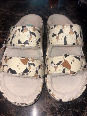 CROCS Cozy Cat Print Fuzz Lined Slide Sandals in Cream, Black, Brown